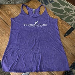 Young Living purple workout tank top size medium.